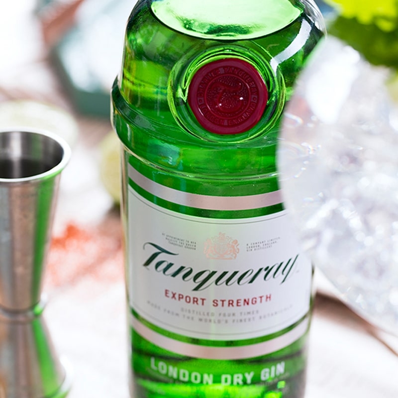 Close up of Tanqueray bottle hero
